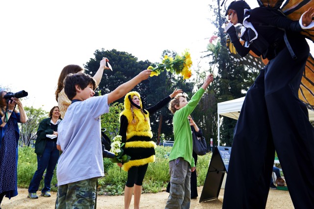 Educators in a bee and butterfly costume entertain kids at Nature Fest