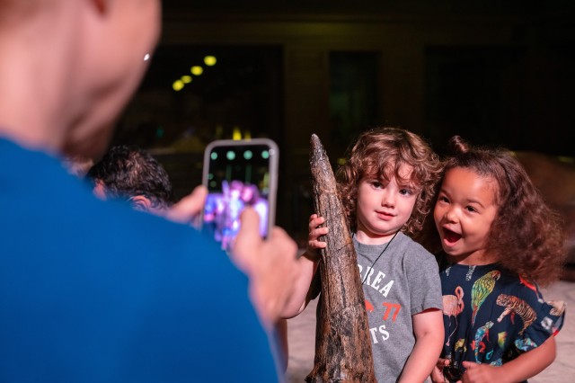 Kids posing for a photo during Dinosaur Encounters show
