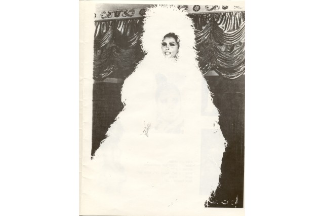 Sir Lady Java in feather costume