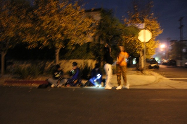 Street at night with people blurred