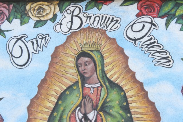 Virgin Mary with &quot;our brown queen&quot; text above