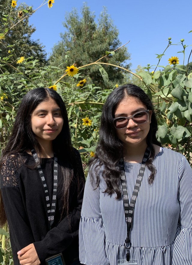 Melissa Nuñez and Maya Montelongo standing in the Nature Gardens