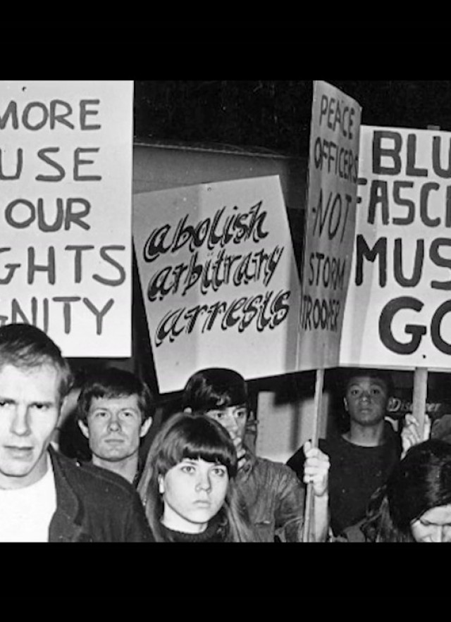 Black Cat Tavern Demonstrators with Protest Signs 