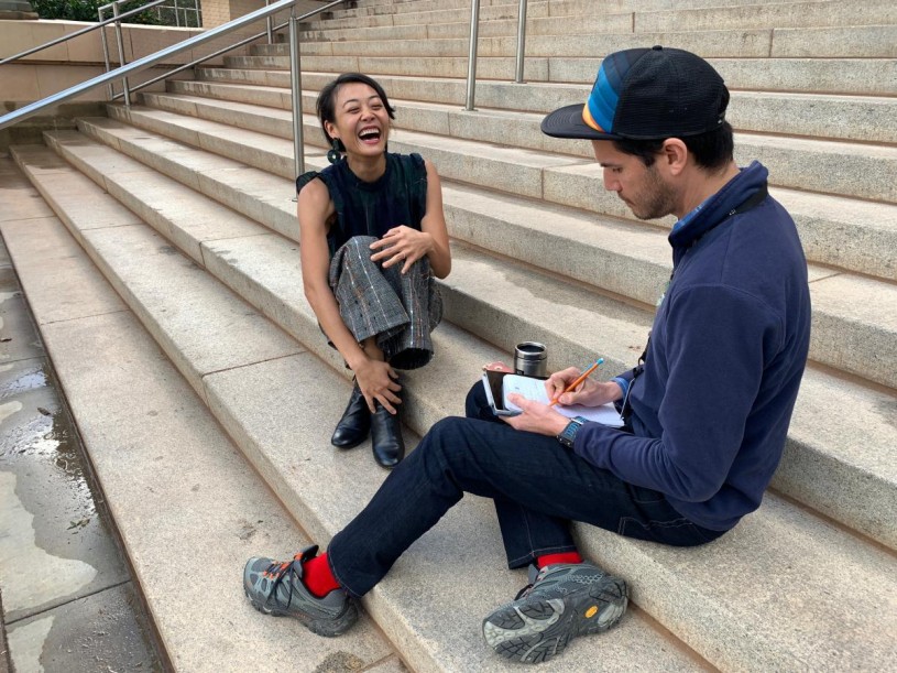 Jane and Richard laughing outside NHM's 1913 building entrance